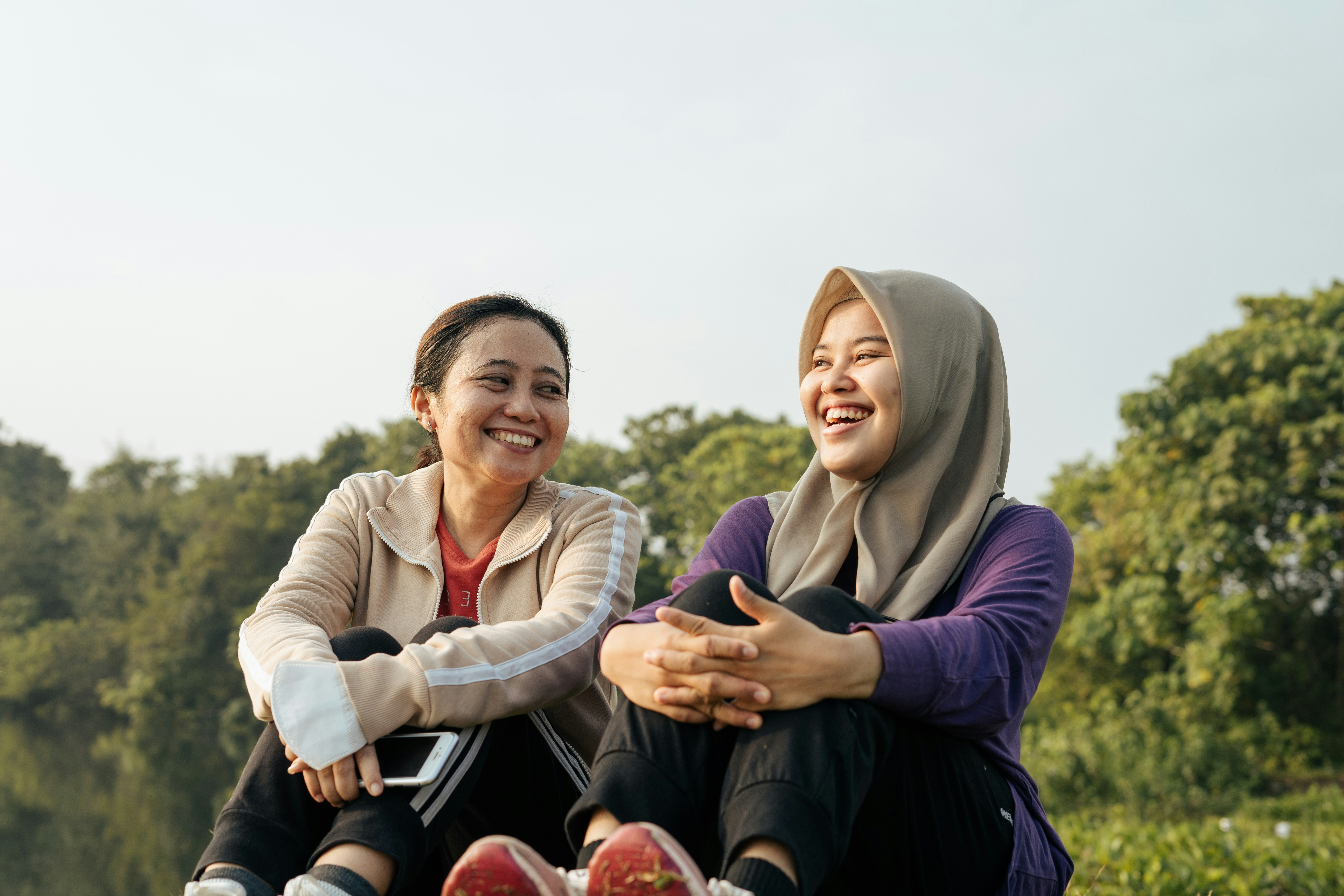 Friends relaxing together outdoors